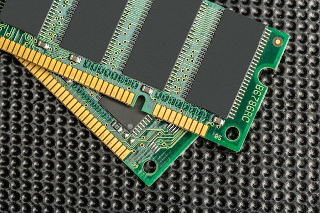 An image showing a close-up of various computer parts, including a heatsink, memory modules, and a GPU, highlighting the complexities and components inside the Xbox Series X console.