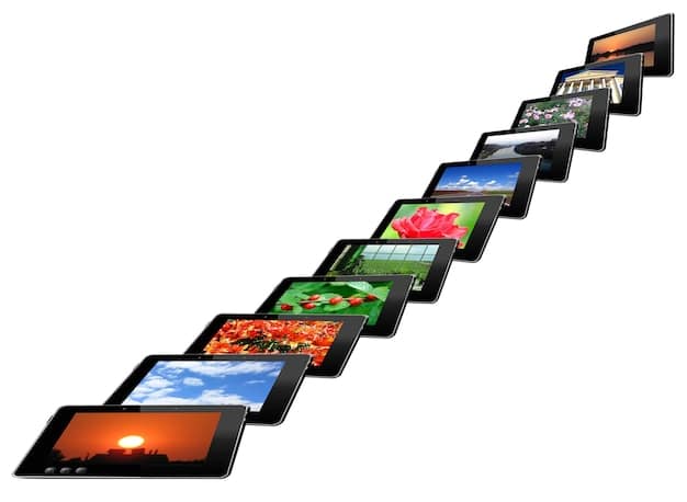 A collage of different devices (smartphones, tablets, smart TVs) displaying various streaming services interfaces - Spotify, Disney+, and Hulu - highlighting the accessibility of these services across multiple platforms.