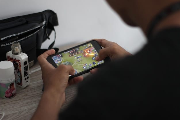A gamer's hand navigating the Game Pass app on a smartphone, with 