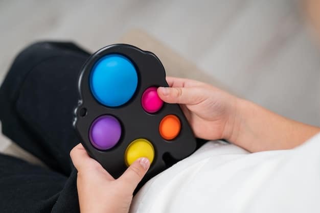 A close-up shot of a gaming controller with unusually large, brightly colored buttons, suggesting customizability for different hand sizes or motor skill needs.