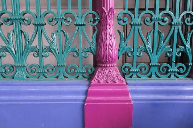 Close-up of an Art Deco building facade in South Beach, Miami, showcasing the geometric shapes, vibrant pastel colors, and stylized ornamentation characteristic of the architectural style.